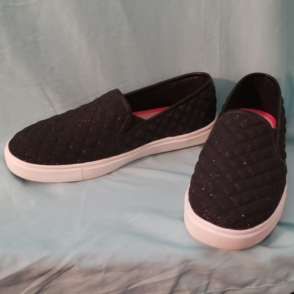 Sparkly black slip-ons